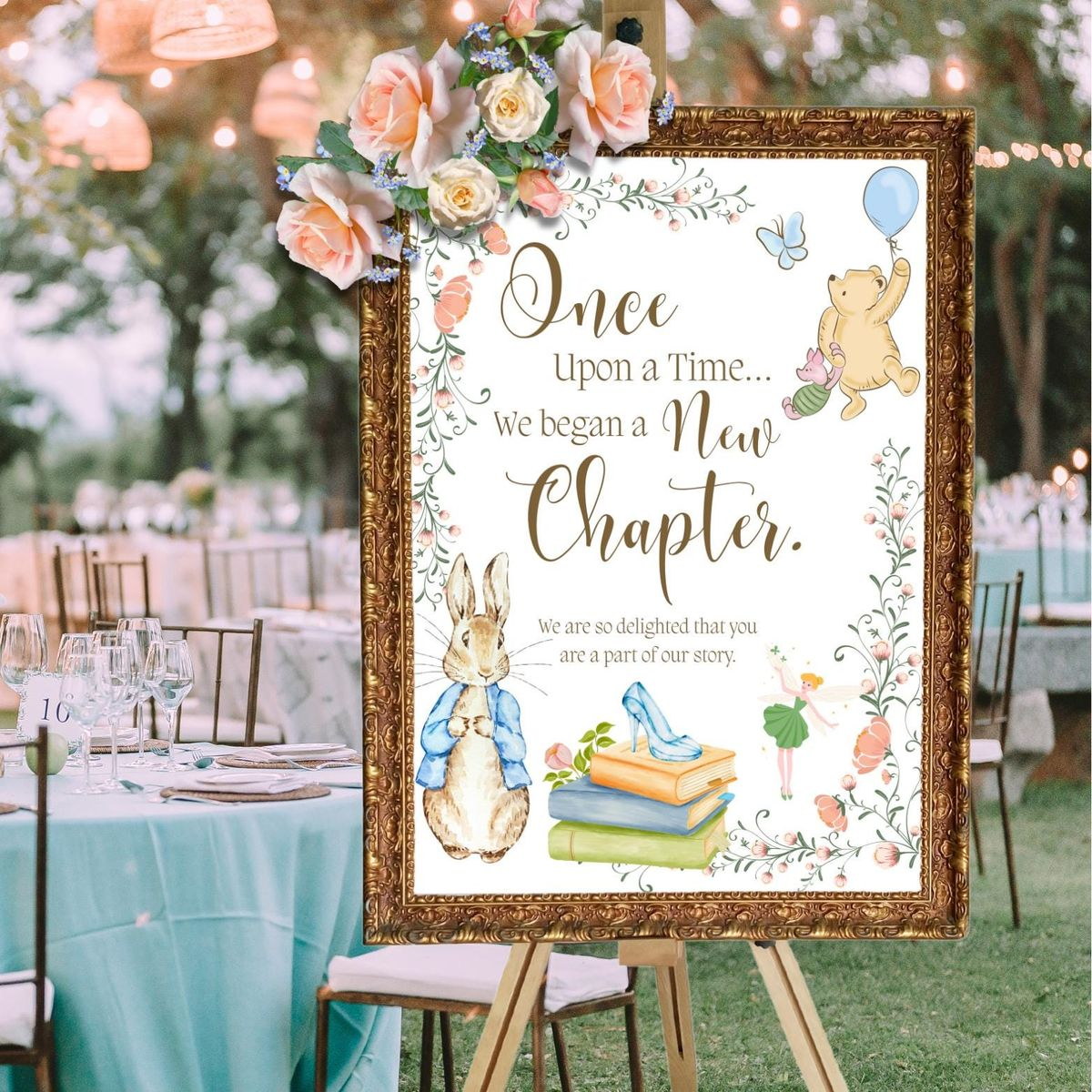 A decorative sign for a baby shower with Peter Rabbit theme